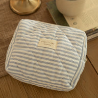 Pochette matelassée en coton biologique - Collection rayée