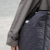 Sac à couches Nomade 22 L couleur ardoise de Dans le sac, en tissu matelassé déperlant récupéré de Canada Goose, fabriqué au Québec.