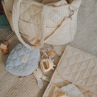 sac à couches rayé jaune avec pochette et tapis de change