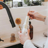 goupillon pour laver une bouteille