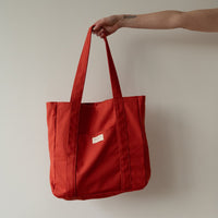 sac fourre tout en coton Dans le sac de couleur rouge orangé 