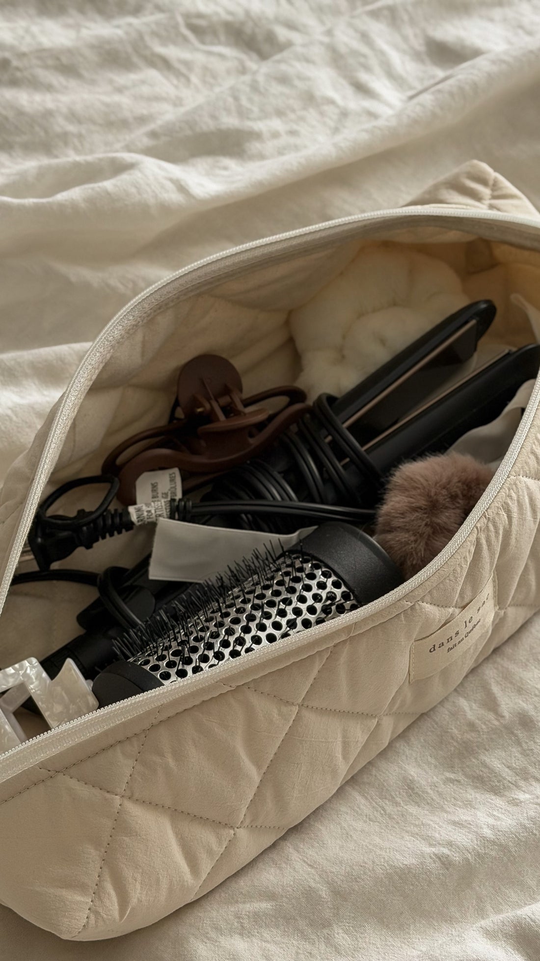 Pochette longue matelassée pour outils coiffants