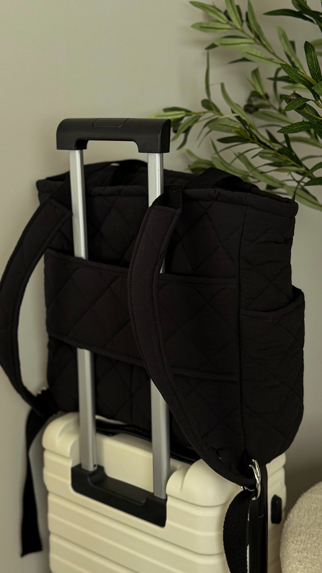 Convertible backpack attached to suitcase