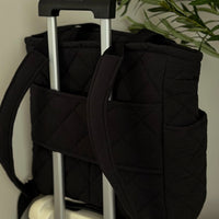 Convertible backpack attached to suitcase