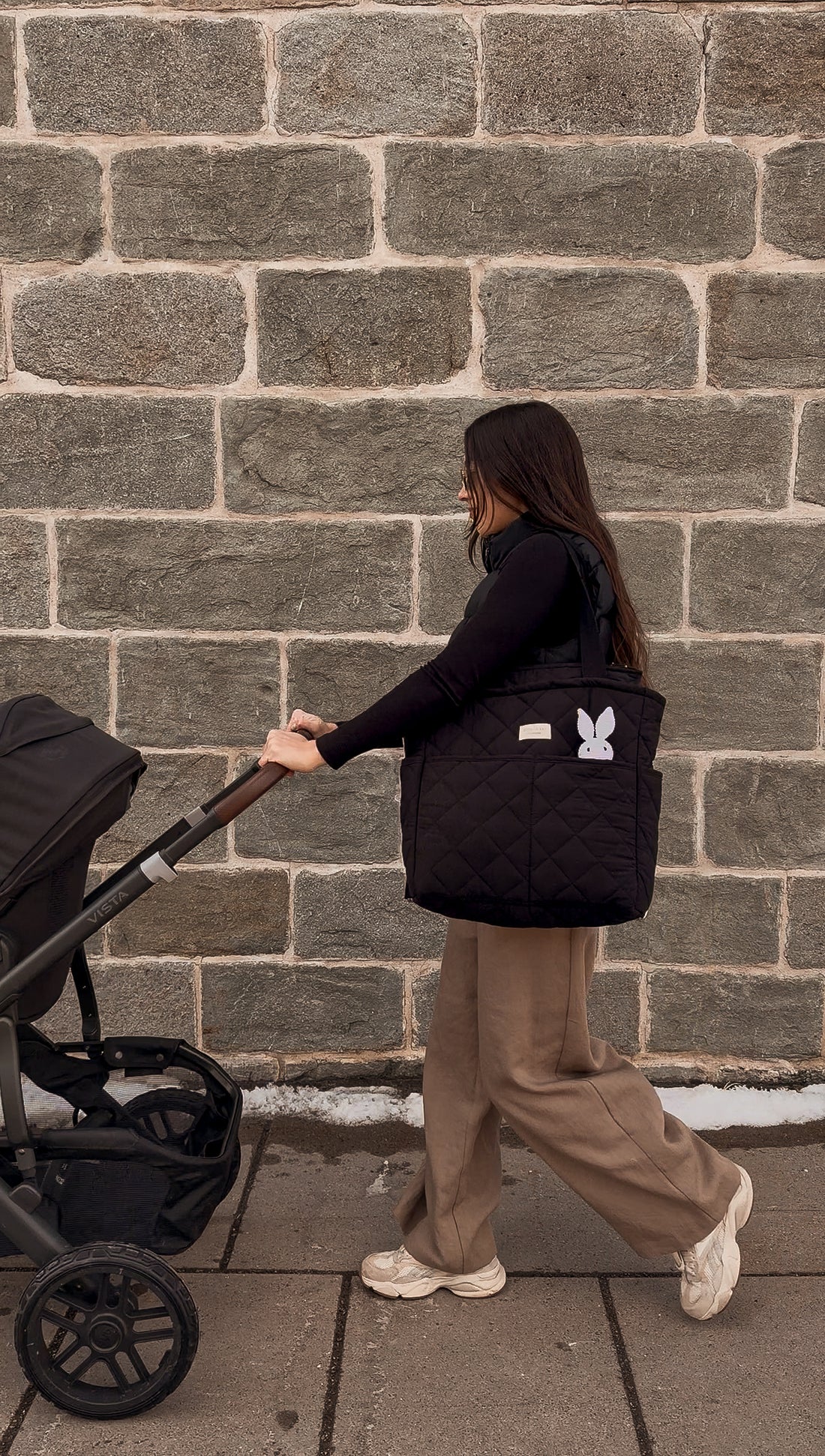 Convertible backpack worn as a shoulder bag