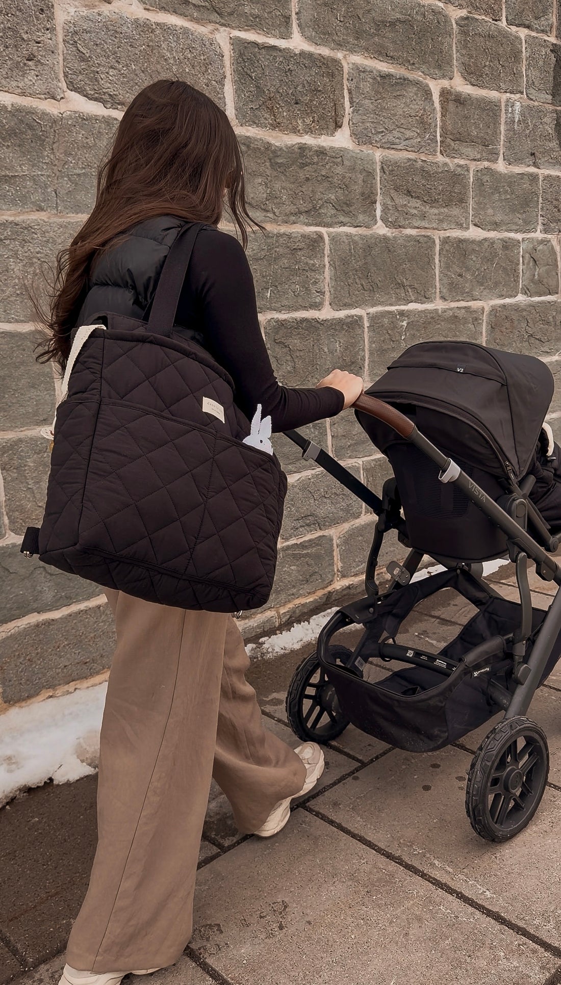 Convertible backpack worn as a shoulder bag