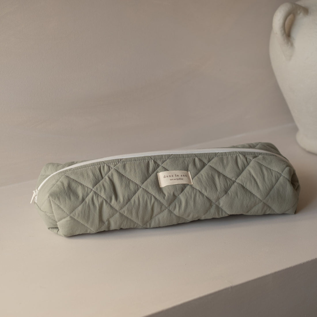 Pochette longue matelassée pour outils coiffants