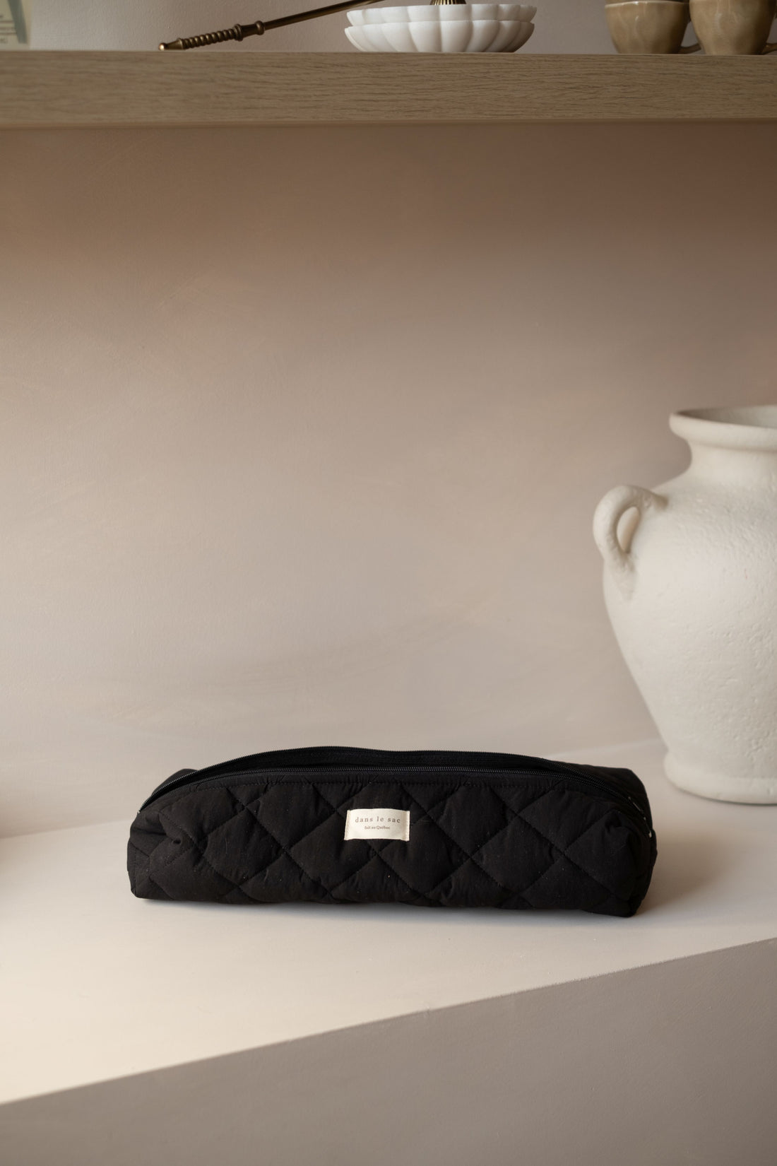 Pochette longue matelassée pour outils coiffants