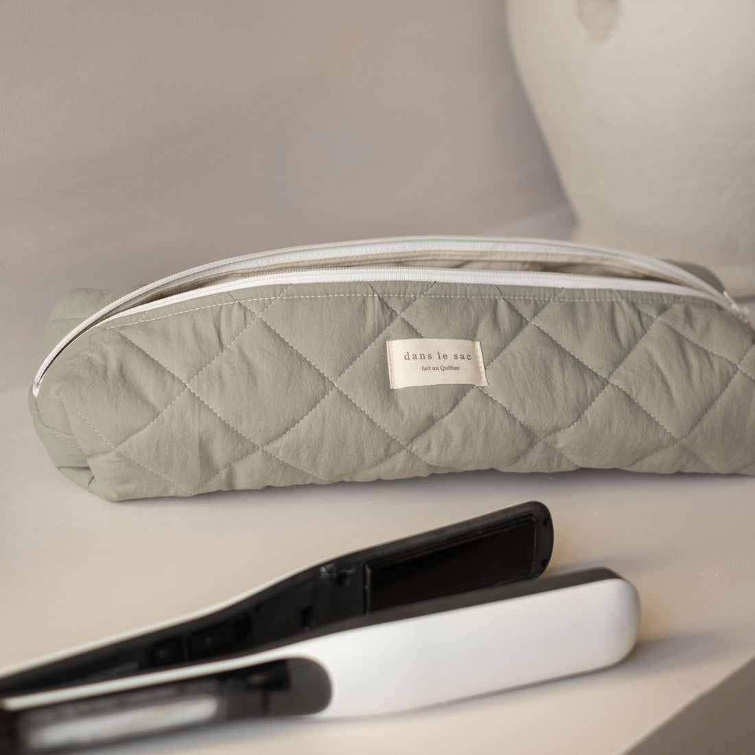 Pochette longue matelassée pour outils coiffants