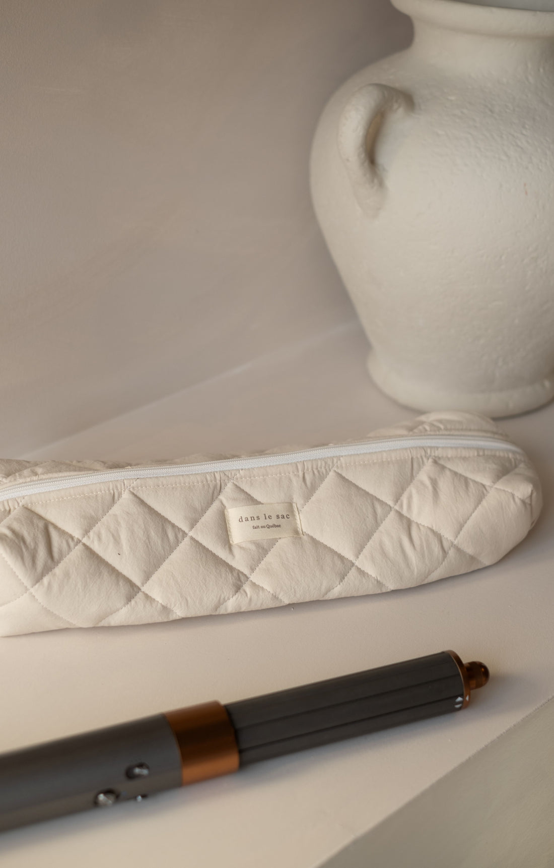 Pochette longue matelassée pour outils coiffants