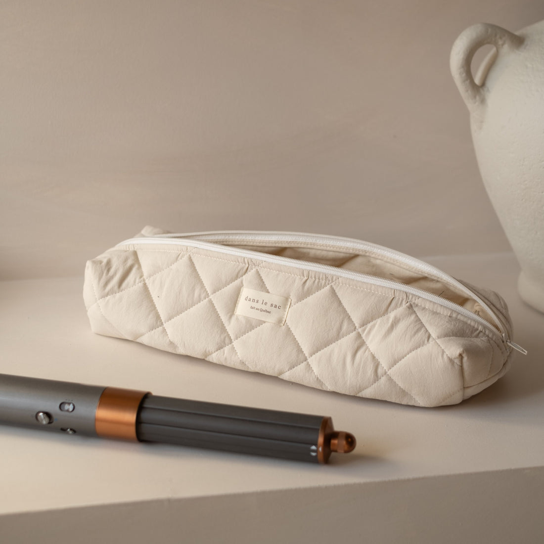 Pochette longue matelassée pour outils coiffants