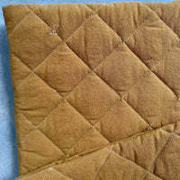 Exemple d'imperfection sur tapis de jeu couleur ambre
