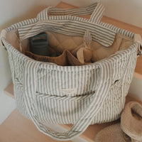 sac à couches rayé sauge dans les marches